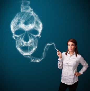 Young woman smoking dangerous cigarette with toxic skull smoke