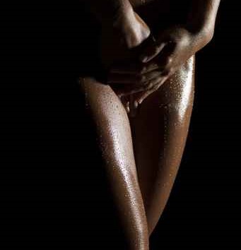 sexy female body shapes and curves over a dark background