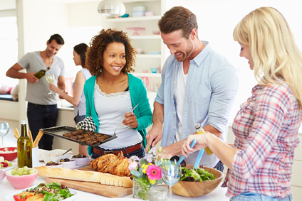Group Of Friends Having Dinner Party At Home