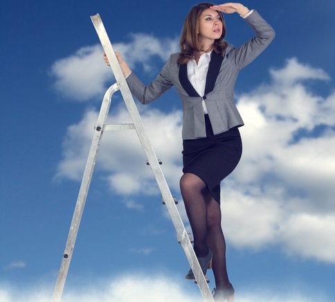 Businesswoman climbing the stairs to the sky