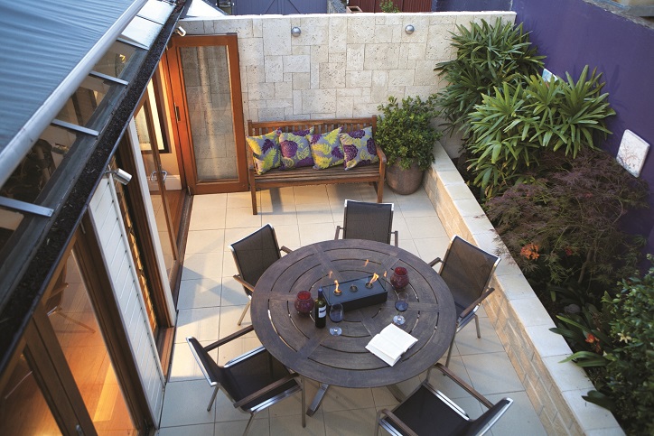 Entertainment area in zoned courtyard