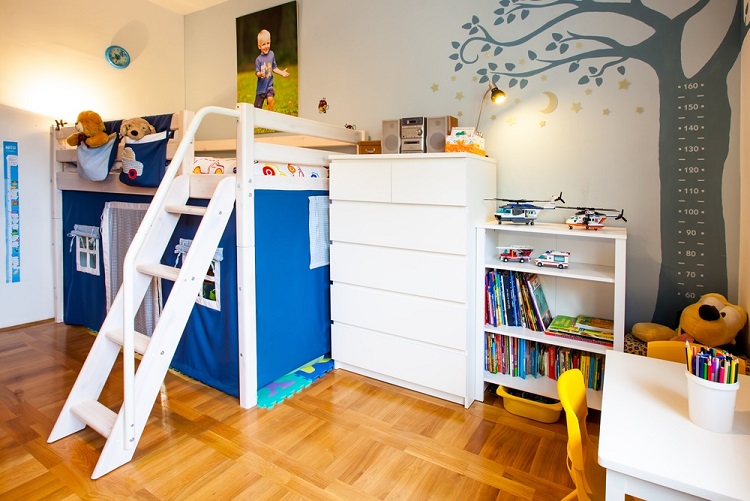 Boy's room with house playground and tree with lost of toys