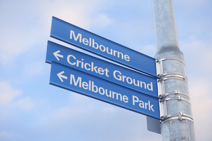 Street sign in Melbourne indicating direction to the cricket ground