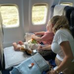 Photo by Rahul Singh: https://www.pexels.com/photo/a-woman-and-a-young-boy-in-an-airplane-5075531/