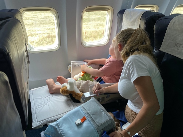 Photo by Rahul Singh: https://www.pexels.com/photo/a-woman-and-a-young-boy-in-an-airplane-5075531/

